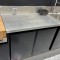Table inox gamme 650 sur placard 2 portes finition noire